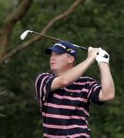 Tripp Isenhour, of Orlando, Fla,. tees off on the fifth hole during the third round of the Nationwide Tournament in Panama City, Panama, in this Jan. 28, 2006 file photo. Isenhour is charged in Orlando, Fla. with killing a protected migratory hawk with a golf shot. It occurred in December when Isenhour was filming a video segment for the television show "Shoot Like A Pro." 
